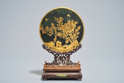 A Chinese spinach jade and hardstone inlaid screen on wooden stand, 20th C.