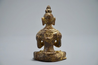 A Nepalese parcel-gilt bronze Buddha Namaskara, 16/17th C.