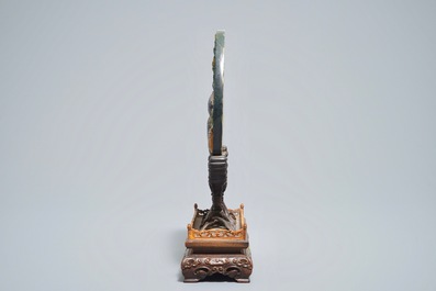 A Chinese spinach jade and hardstone inlaid screen on wooden stand, 20th C.