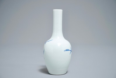 A Chinese blue and underglaze red 'sanduo' vase, Kangxi mark, 19/20th C.