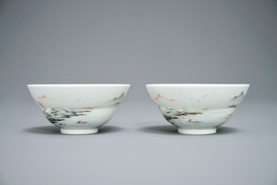 A pair of Chinese famille rose tea bowls with a landscape, Qianlong mark, 20th C.