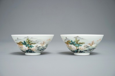 A pair of Chinese famille rose tea bowls with a landscape, Qianlong mark, 20th C.