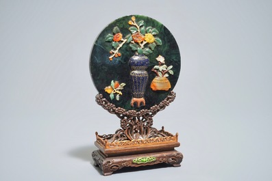 A Chinese spinach jade and hardstone inlaid screen on wooden stand, 20th C.