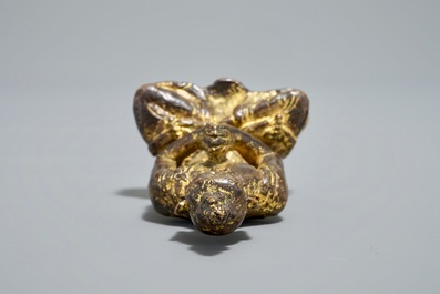 A Nepalese parcel-gilt bronze Buddha Namaskara, 16/17th C.