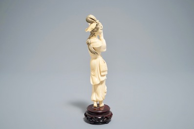 A fine Chinese carved ivory figure of the female warrior Hua Mulan, 1st half 20th C.