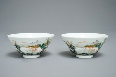 A pair of Chinese famille rose tea bowls with a landscape, Qianlong mark, 20th C.
