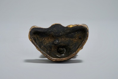 A Nepalese parcel-gilt bronze Buddha Namaskara, 16/17th C.