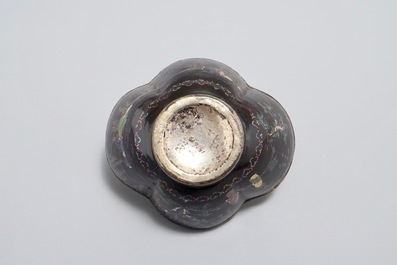 Five Chinese quatrefoil silver and lac burgaute saucers and four cups, 17/18th C.
