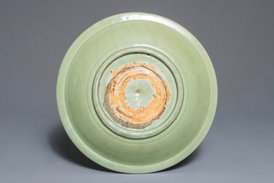 A Chinese Longquan celadon charger with underglaze floral design, Ming