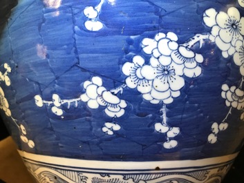 A Chinese blue and white fish bowl with design of prunus on cracked ice, 19th C.