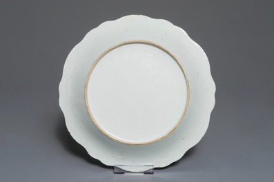 Four Chinese famille rose plates and a charger with landscape designs, Qianlong