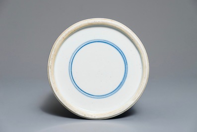 A Chinese monochrome blue tea caddy with underglaze design, Kangxi