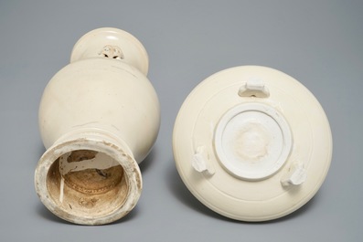 A Chinese monochrome cream-glazed vase and a tripod censer, Ming
