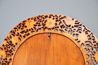 A finely carved Chinese wooden mirror frame, Canton, 19/20th C.