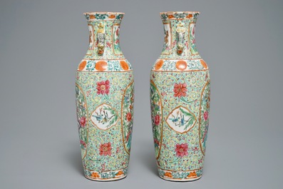 A pair of Chinese famille rose turquoise-ground vases, 19th C.