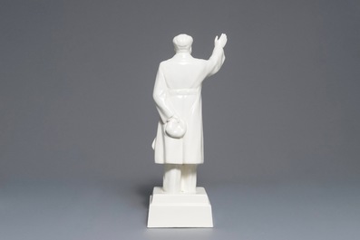 A tall Chinese figure of Mao Zedong waving on stand, marked on the base, 2nd half 20th C.