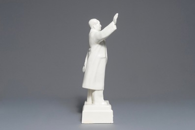 A tall Chinese figure of Mao Zedong waving on stand, marked on the base, 2nd half 20th C.