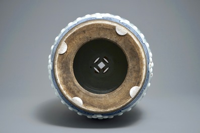 A Chinese blue and white 'lotus scroll' garden seat, Qianlong