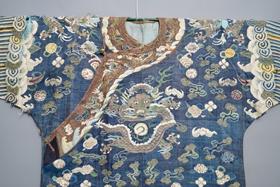 A Chinese blue-ground kesi eight-dragon robe, 19th C.