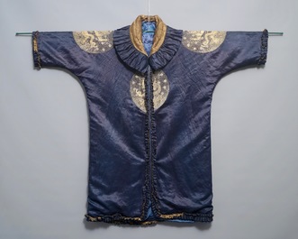 A blue-ground silk coat composed of Imperial Chinese gold thread dragon badges, 19th C.