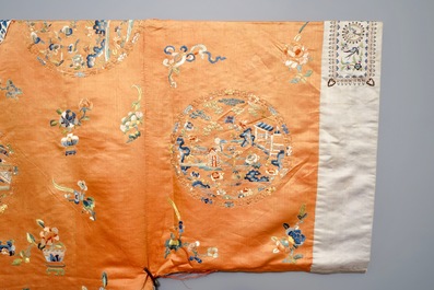 A Chinese orange-ground embroidered silk robe, 19th C.