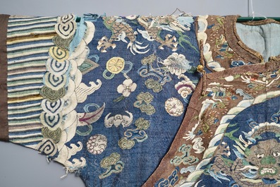 A Chinese blue-ground kesi eight-dragon robe, 19th C.