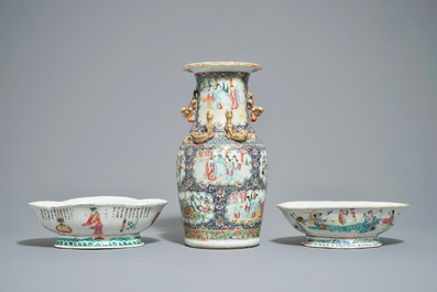 Two Chinese famille rose bowls and a Canton blue-ground vase, 19th C.