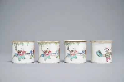 Four cylindrical Chinese famille rose covered boxes, 19th C.