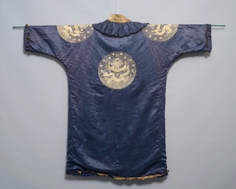 A blue-ground silk coat composed of Imperial Chinese gold thread dragon badges, 19th C.