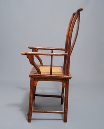 A Chinese elm wood "official's hat" armchair, 19th C.