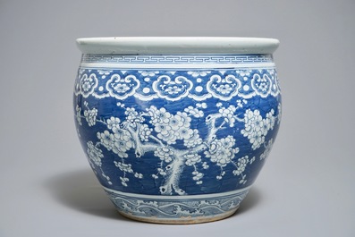 A Chinese blue and white fish bowl with design of prunus on cracked ice, 19th C.