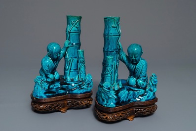 A pair of Chinese turquoise glazed incense holders on wooden stand, 19th C.
