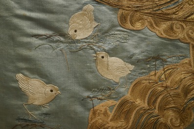 A Japanese silk embroidery depicting a rooster on an o-daiko drum, Edo or Meiji, 19th C.