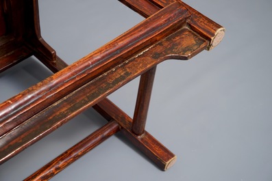 A Chinese elm wood "official's hat" armchair, 19th C.