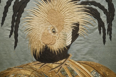 A Japanese silk embroidery depicting a rooster on an o-daiko drum, Edo or Meiji, 19th C.
