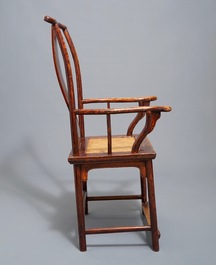 A Chinese elm wood "official's hat" armchair, 19th C.