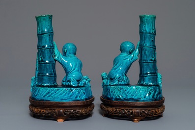 A pair of Chinese turquoise glazed incense holders on wooden stand, 19th C.