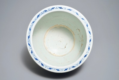 A Chinese blue and white fish bowl with design of prunus on cracked ice, 19th C.