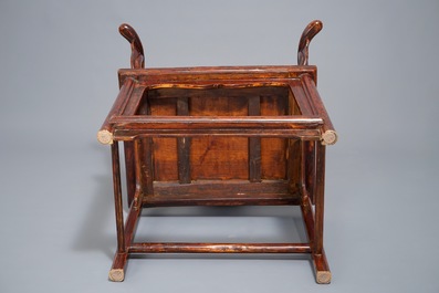 A Chinese elm wood "official's hat" armchair, 19th C.