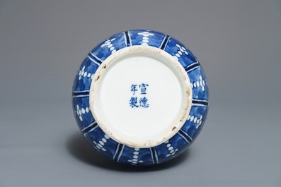 A Chinese blue and white bottle vase with animals, Xuande mark, 19th C.