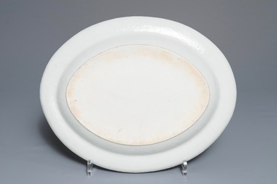 Three Chinese famille rose plates and an oval dish, 18/19th C.