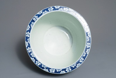 A Chinese blue and white dish and a fish bowl with floral design, Kangxi and 19th C.