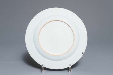 Three Chinese famille rose plates and an oval dish, 18/19th C.