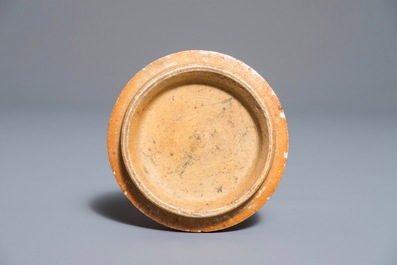 A Chinese monochrome oxblood-glazed jar and cover, 19th C.