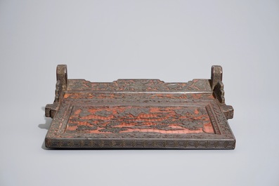 A Chinese red and black cinnabar lacquer table screen with figures, 19/20th C.