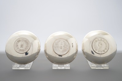 Nine Chinese silver coin bowls, mark of Wang Hing, 19/20th C.