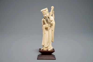 Two Chinese carved ivory figures of Shou Lao and Lu Dongbin, 19th C.