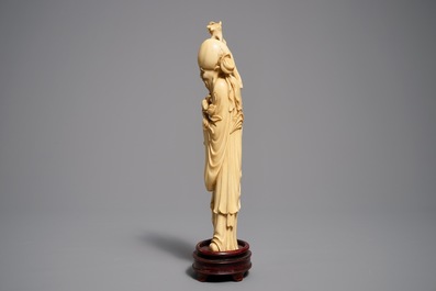 Two Chinese carved ivory figures of Shou Lao and Lu Dongbin, 19th C.