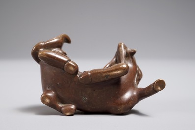 A Chinese bronze scroll or paper weight shaped as a ram, 17/18th C.