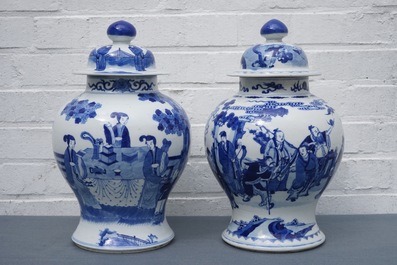 Two Chinese blue and white vases and covers with figures, 19th C.
